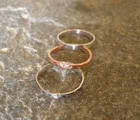 3 stackable rings in silver and copper